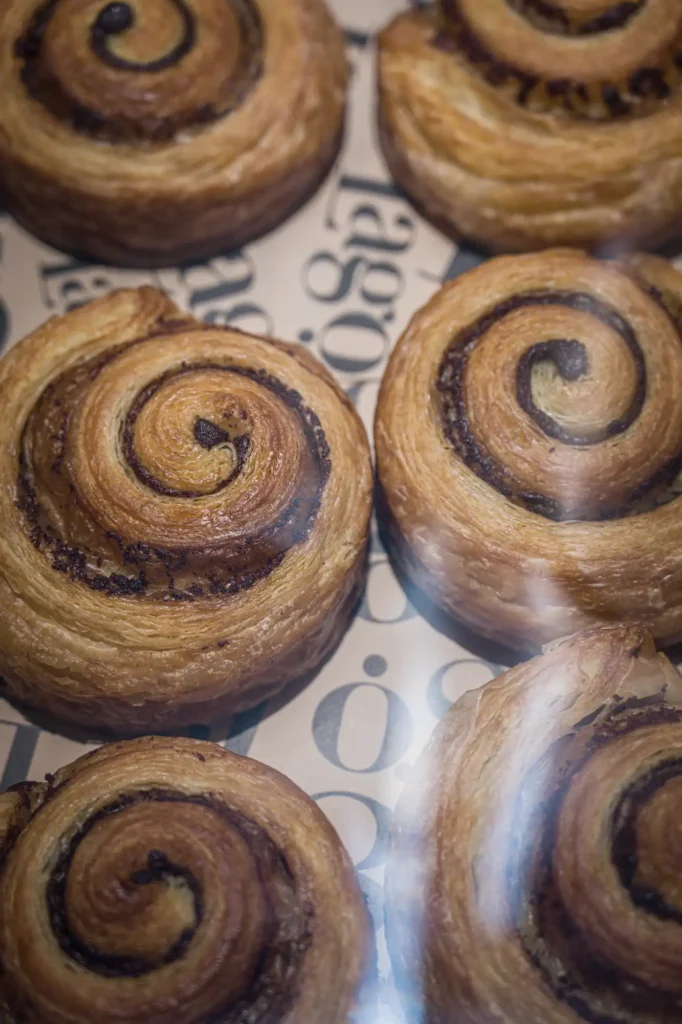 Chocolate scrolls fresh from the oven on Lago-printed paper at Dawn cafe Lago Nusa Lembongan