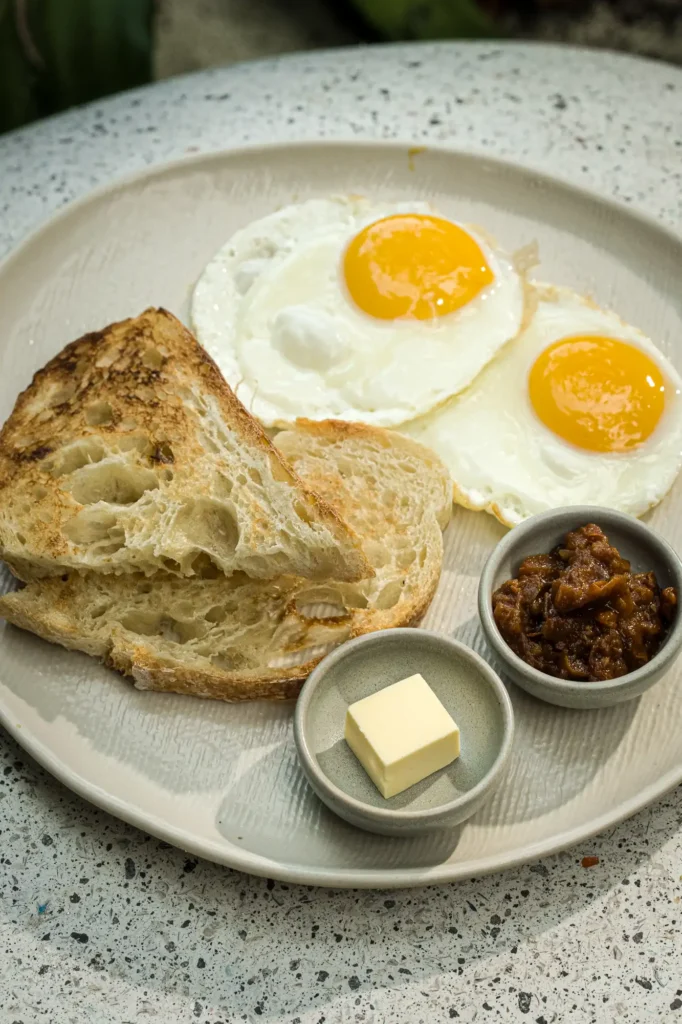 Fried eggs on sourdough with sambal and butter at Dawn cafe Lago Nusa Lembongan