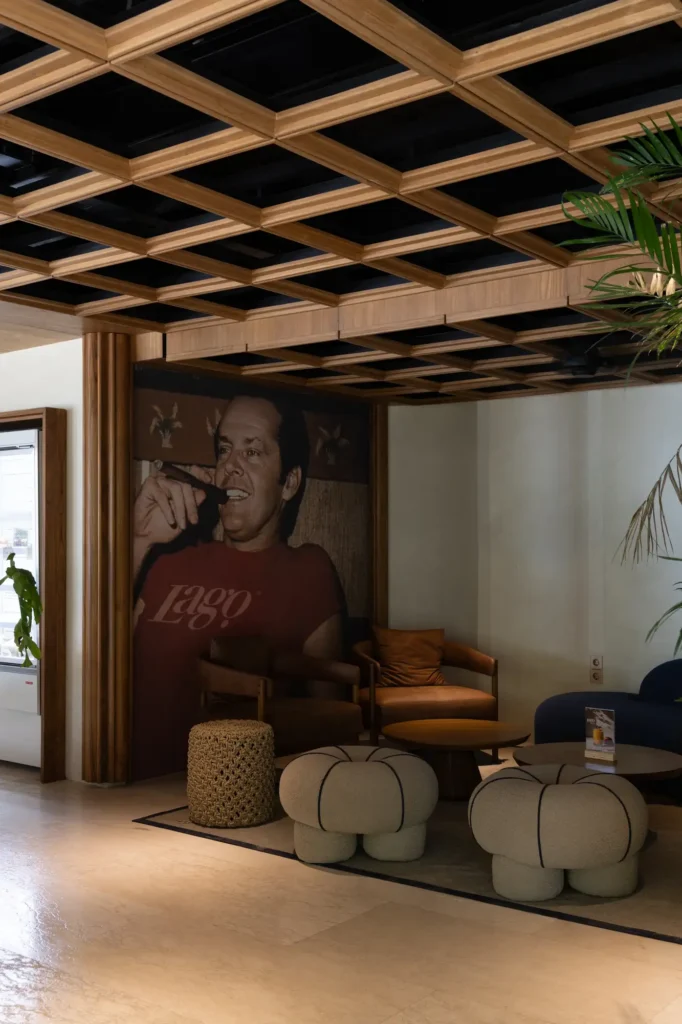 Lounge area at Dawn with the Lago Jack Nicholson mural and leather armchairs at Lago Nusa Lembongan